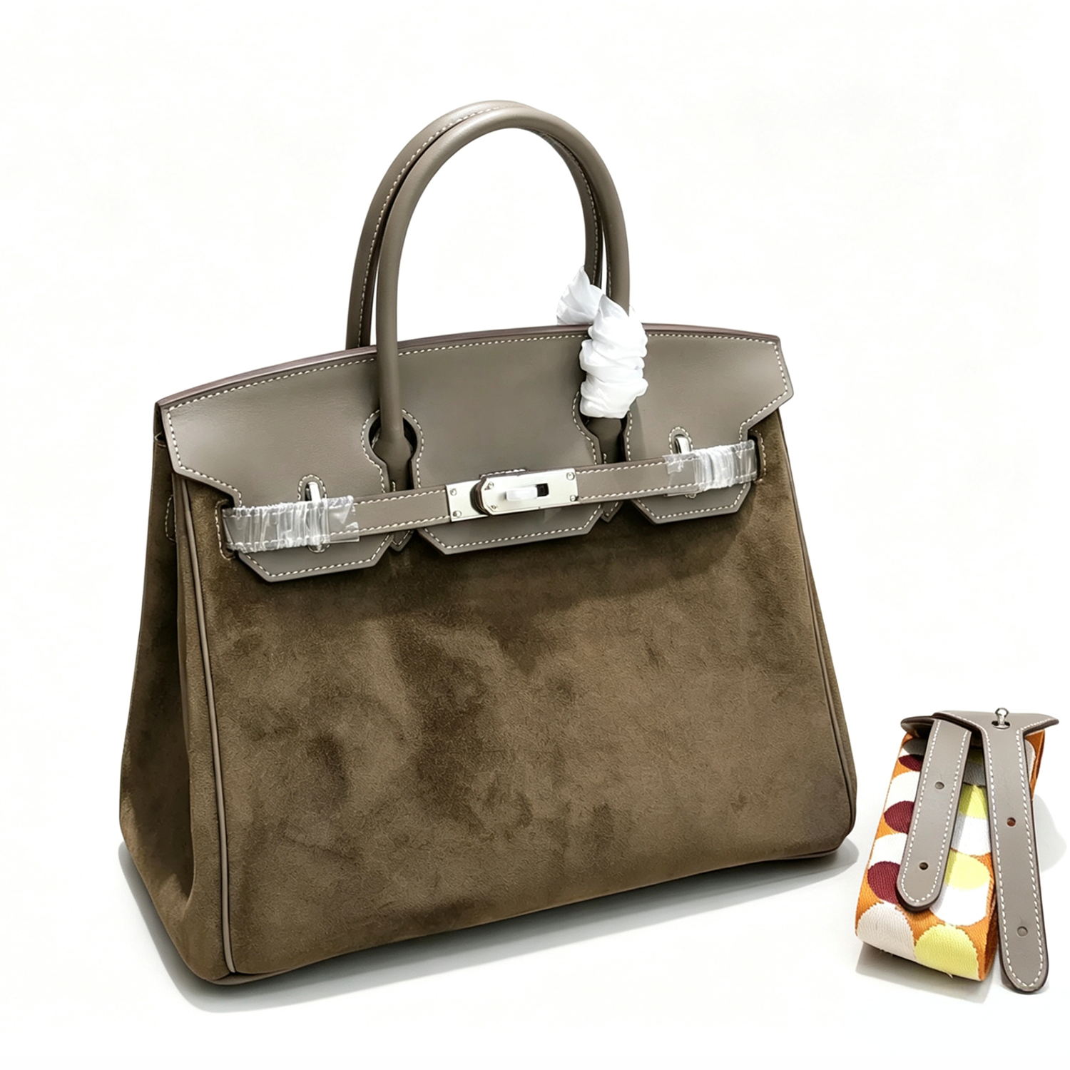 Warm Earthy Taupe Dual Texture Medium Trapezoid Hand Suede Tote With Sleek Matte Taupe Trim And Cool Polished Silvery Twist Lock Hardware