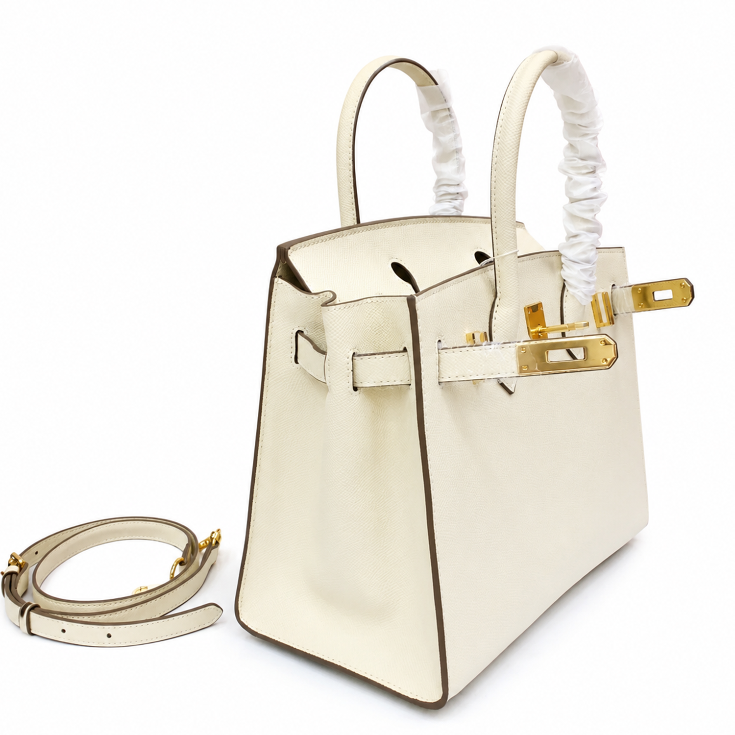 Pale Chalk Off-White Fine Grain Sharp Seam Compact Trapezoid Tote With Warm Golden Twist Lock Hardware And Matching Detachable Carry Strap Leather